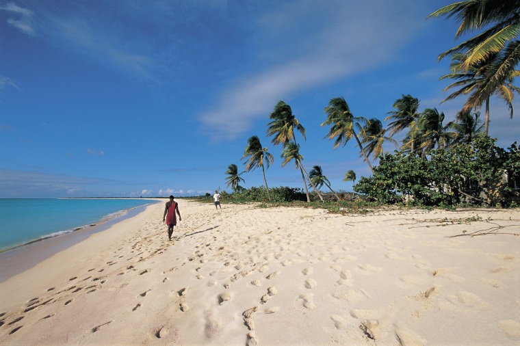 Two men on the beach, Barbuda, Antigua and Barbuda